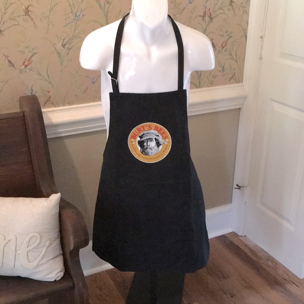 Burt’s Bees- black with Burt’s bees logo- adjustable neck and back ties